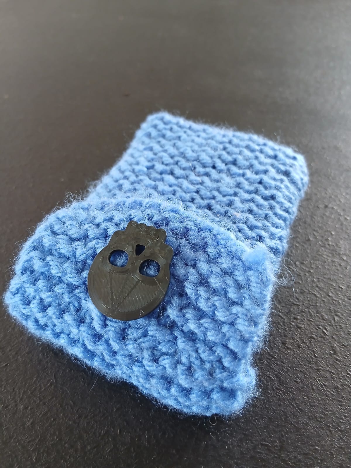 Hand Knitted Blue Pouch with Skull Button Closure